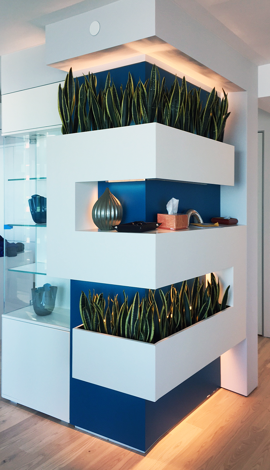 This big column in a high-rise building was perfect for a custom planter. We designed it, and Studio Becker made it.