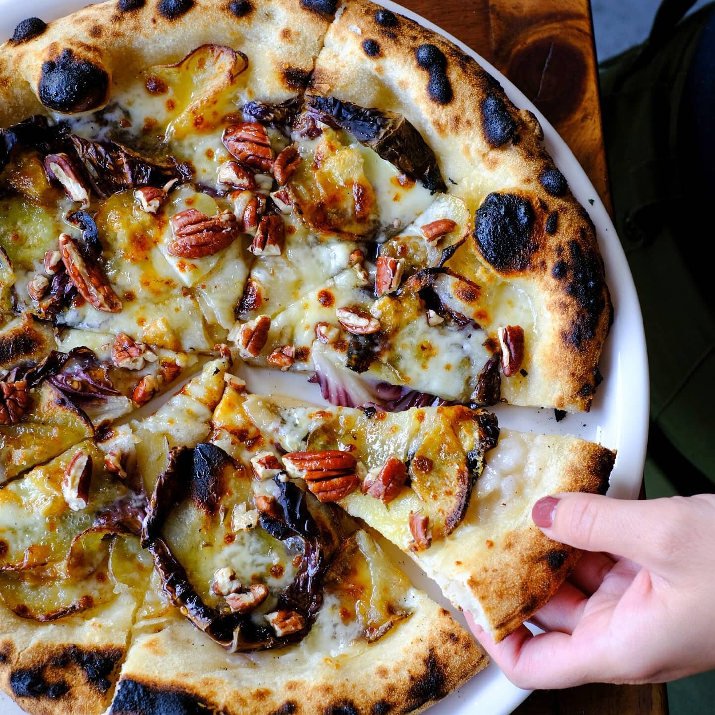 Potatoes &amp; Blue cheese are a match made in heaven, on top if a bed of raddichio, finished with some pecans and fermented honey🍠🍯🍕