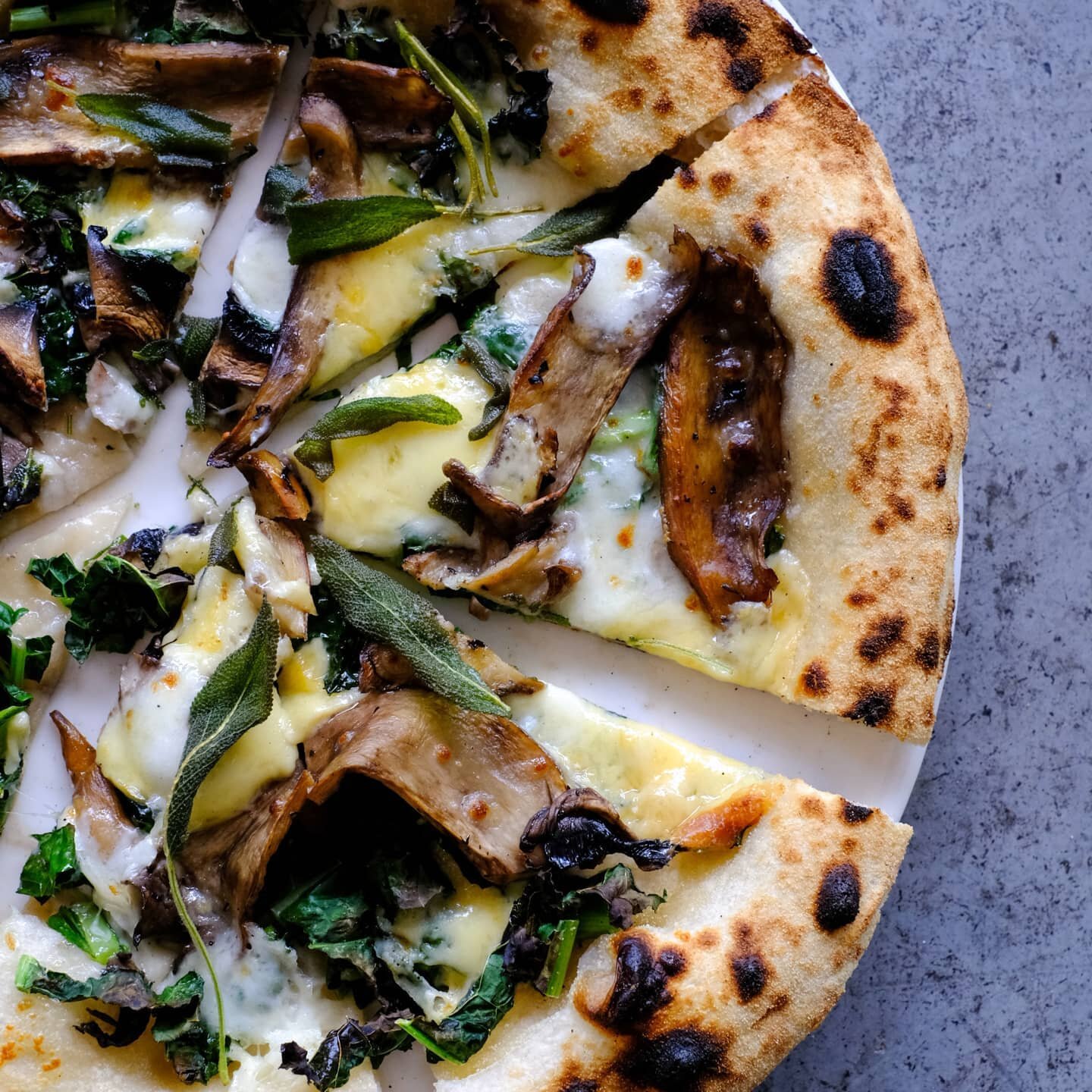 Portobellos, smoked cheddar, cavolo nero, fior di latte, fried sage.

Thats our kind of pizza and it's available all week🍕🍄