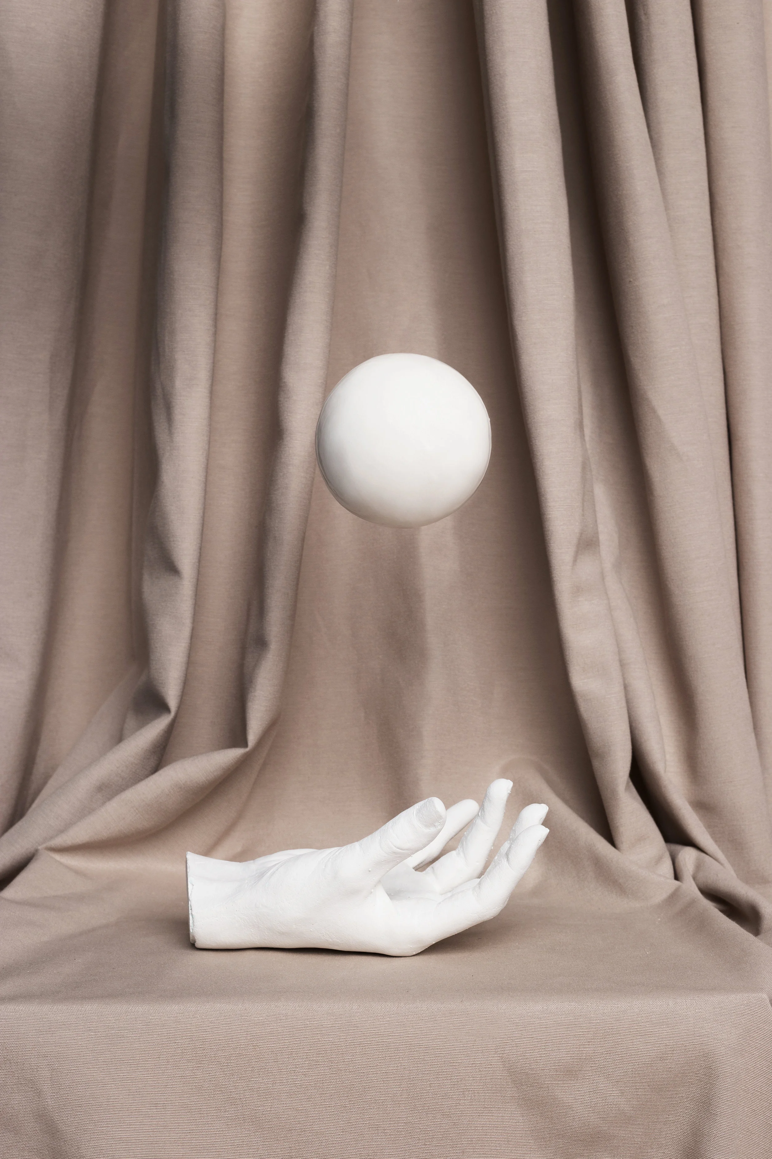 Plaster Hand + Ball Set: La Cueva Studio & Marcela Luna Photo: Erika Anes
