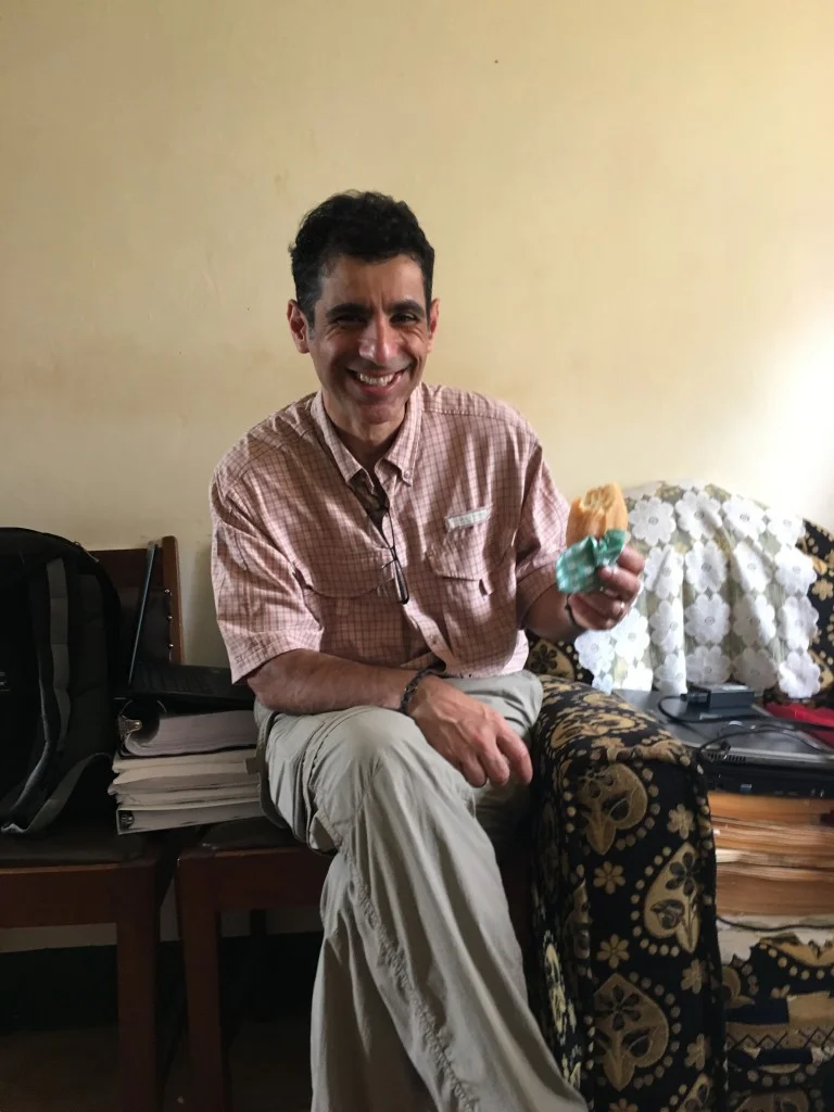 Sam takes a break mid-morning and has traditional tea and mandazi.