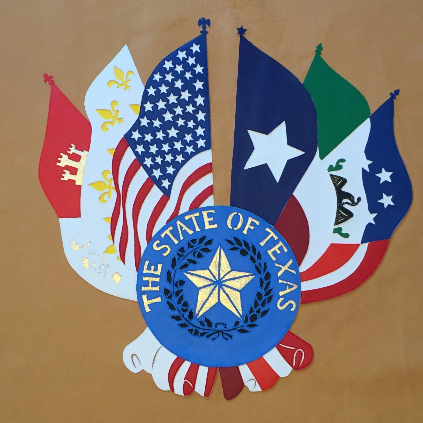 six flags and state seal of Texas
