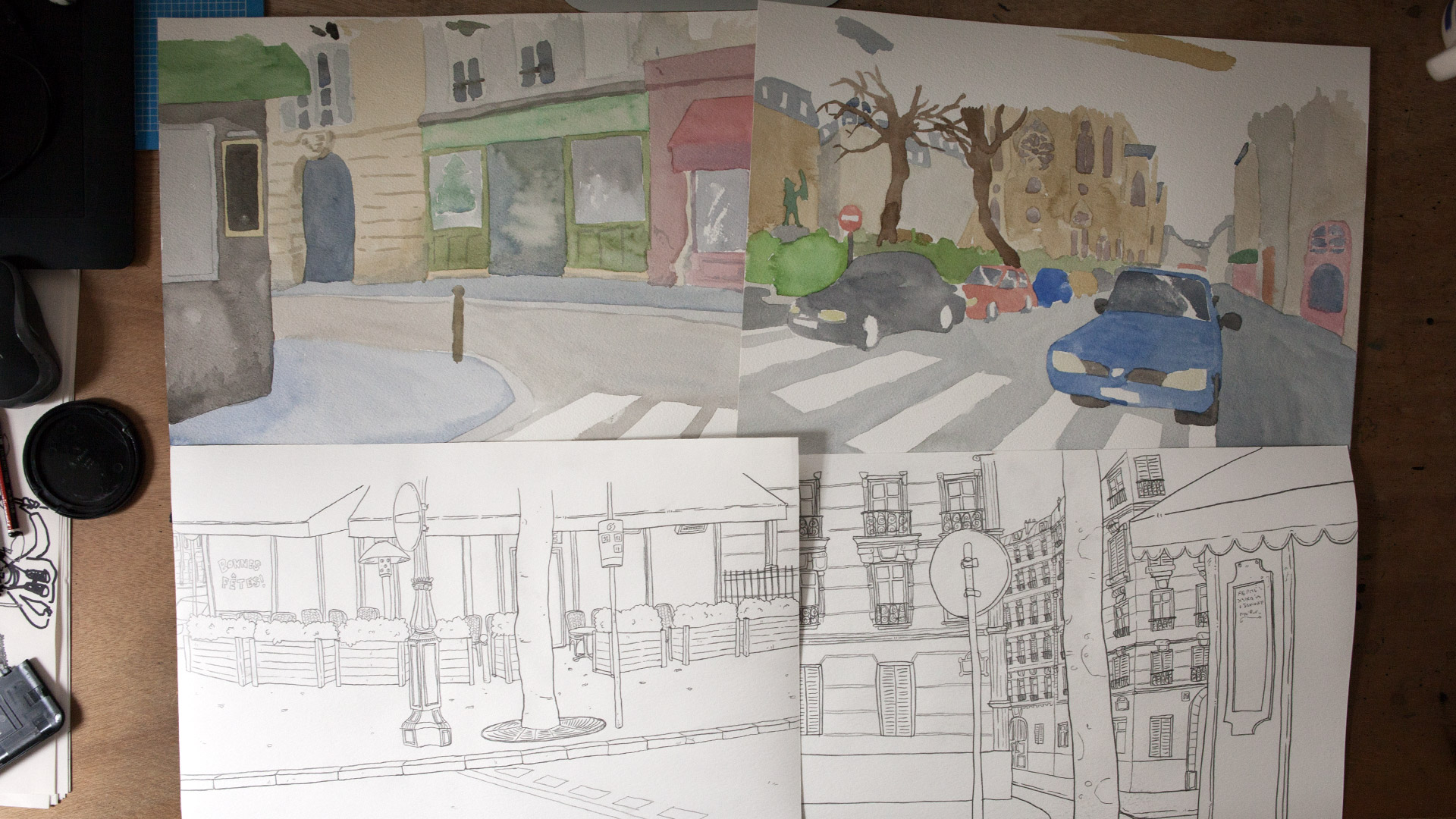 Here are some of the backgrounds. Line drawing on one sheet, colours on an other. This allows the retouching of certain colours if needed. For exemple to make sure a building, a sidewalk, or a street is roughly the same colour over multiple shots. 