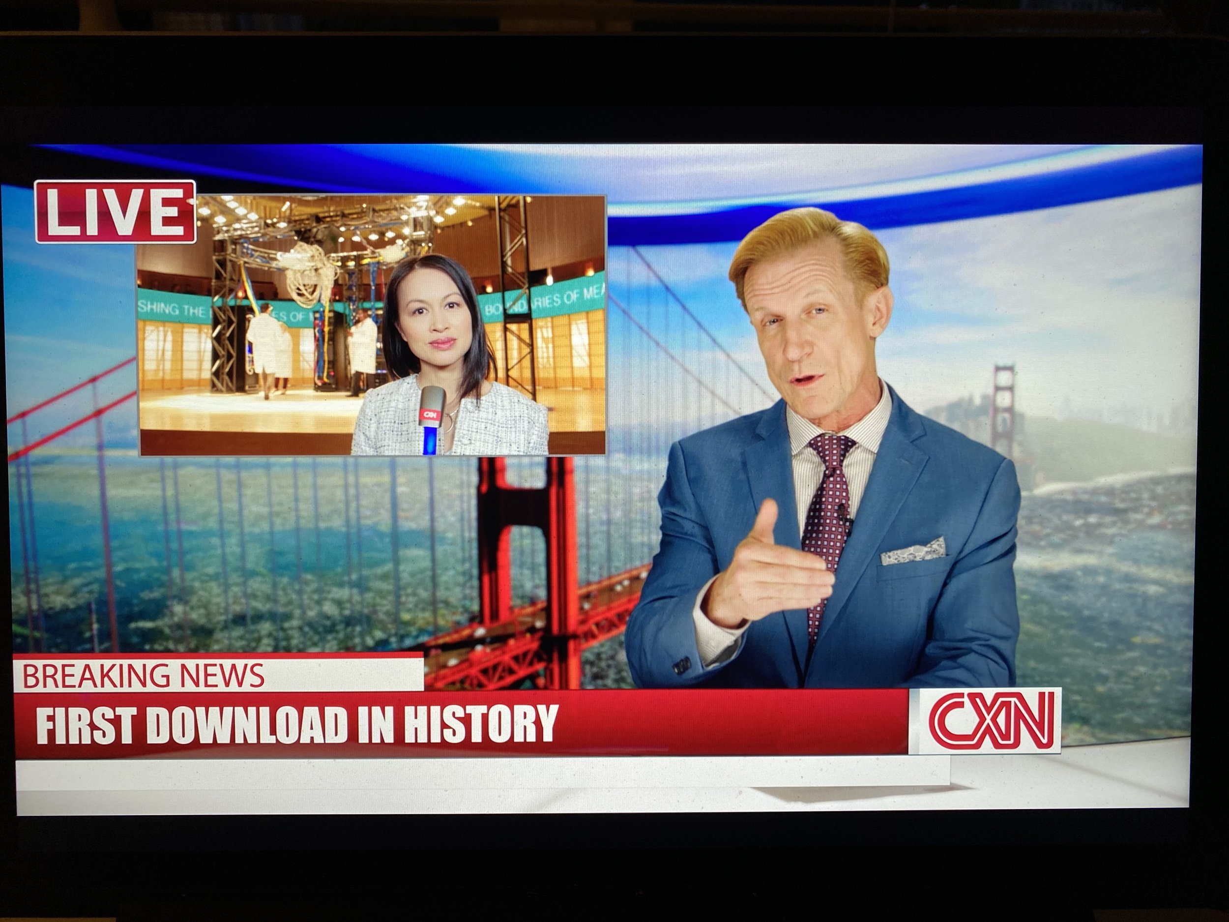 Clay St. Thomas on TV as a news anchor.jpeg