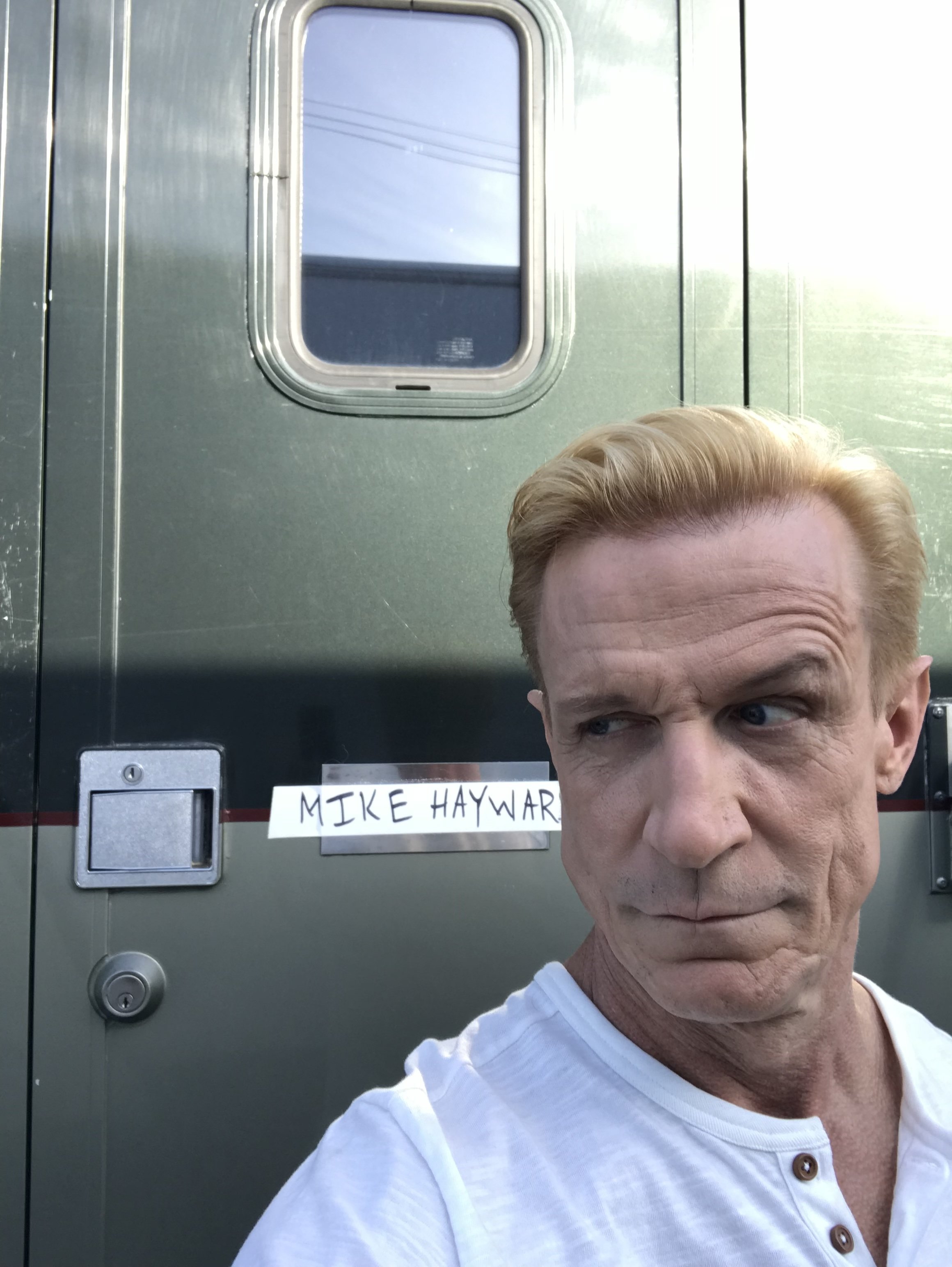 Clay St.Thomas outside his trailer on set.jpeg
