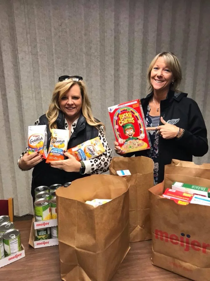 Please donate to the Neighborhood House Food Pantry