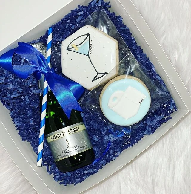 I posted the boxes for the guests of honor, but we also did a version for all of our friends celebrating together. The cookies were magic!