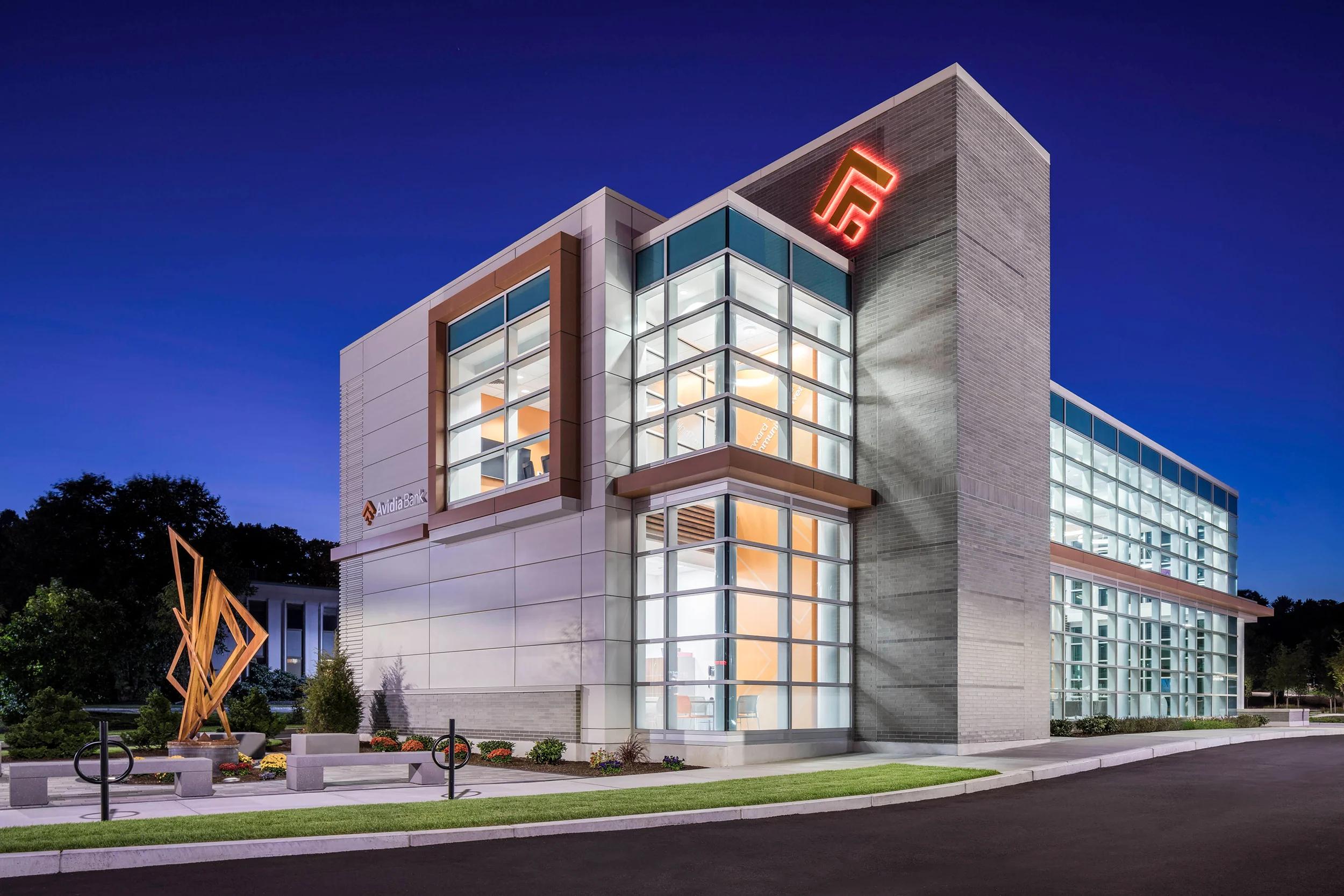 Avidia Bank at dusk in Framingham MA. Architectural designby Studio Q Architecture.