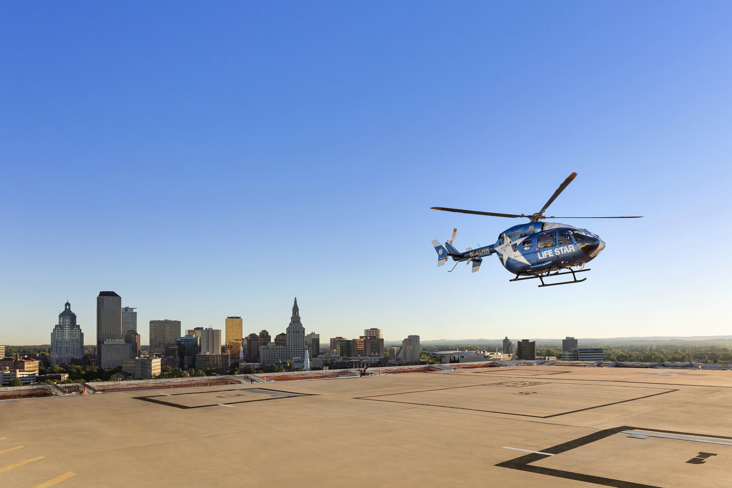 HHC LifeStar Helicopter Landing on 13th floor helipad of Hartford Hospital. 8'x12' Mural sized  wall in HHC Corporate HQ Conference Room.