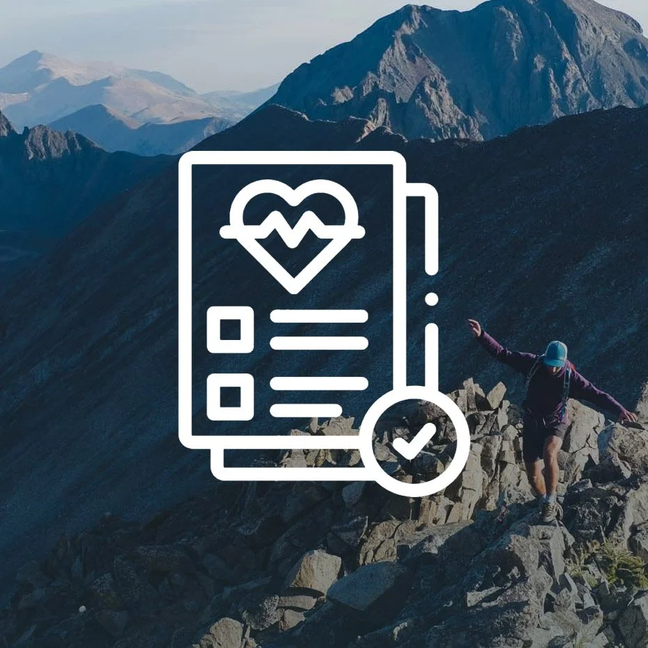 A person hiking on a rocky mountain trail with mountains in the background, overlaid with a white icon of a medical report featuring a heart with an EKG line and a check mark.