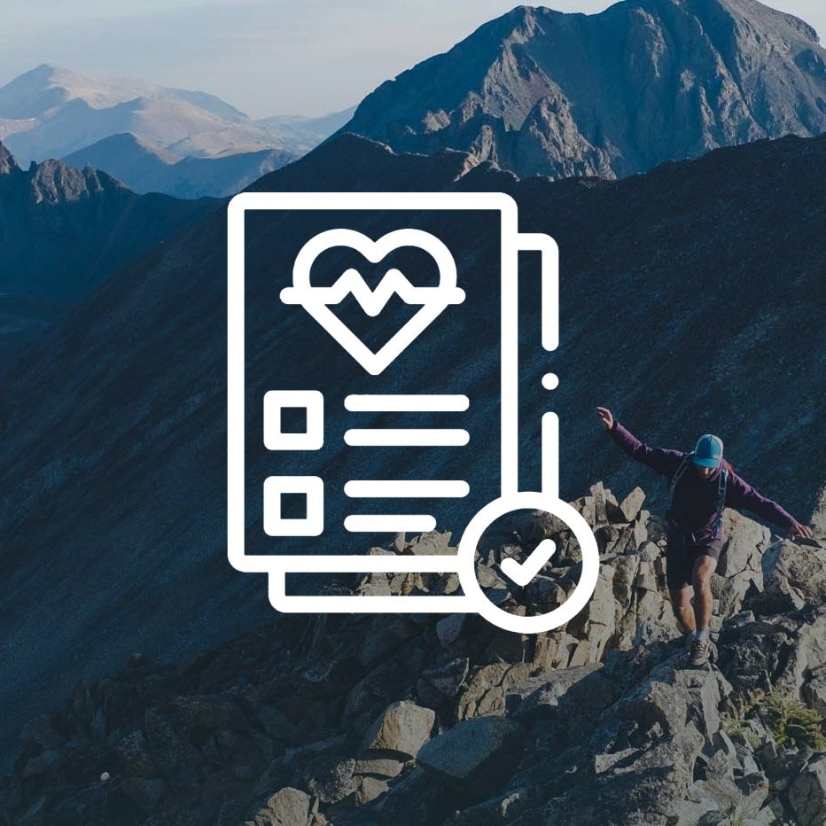 A person hiking on rocky mountain terrain with mountains in the background and an overlay of health and fitness icons, including a heart with a pulse line, checkmark, and text box.