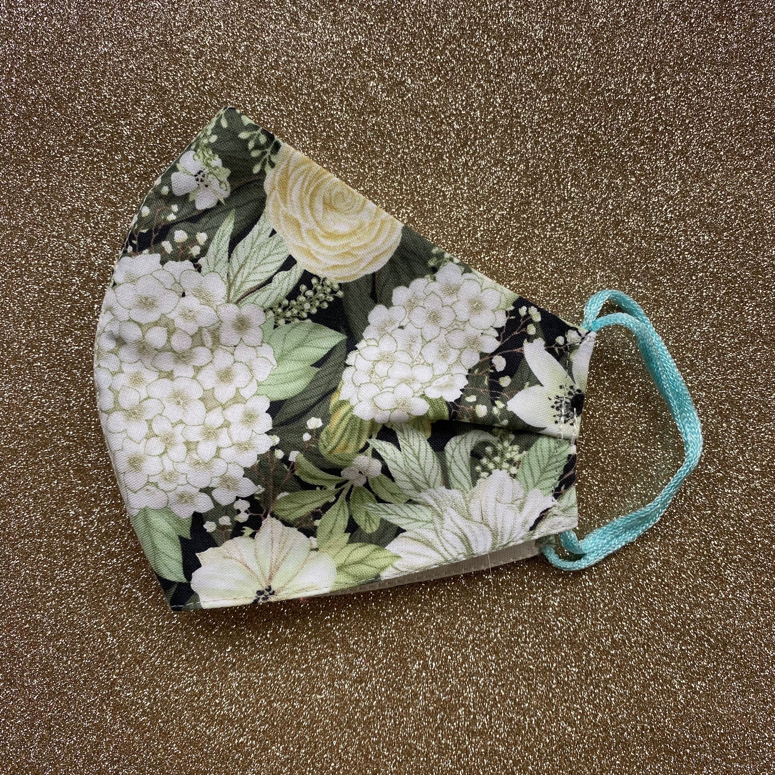 green multi floral mask