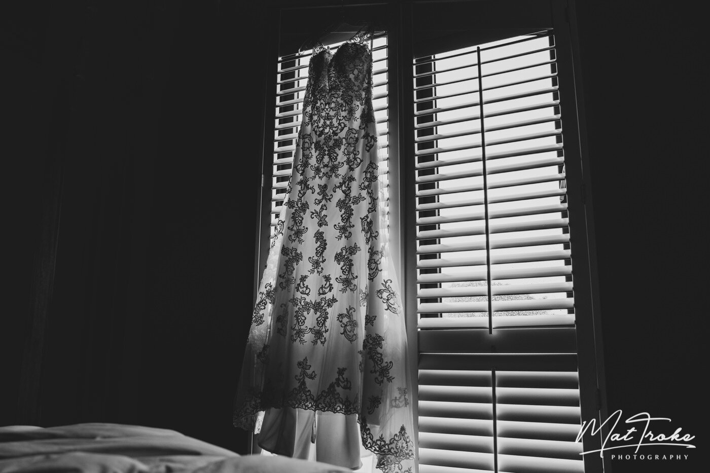 Lace Wedding Dress Hanging Sherwood Retreat window