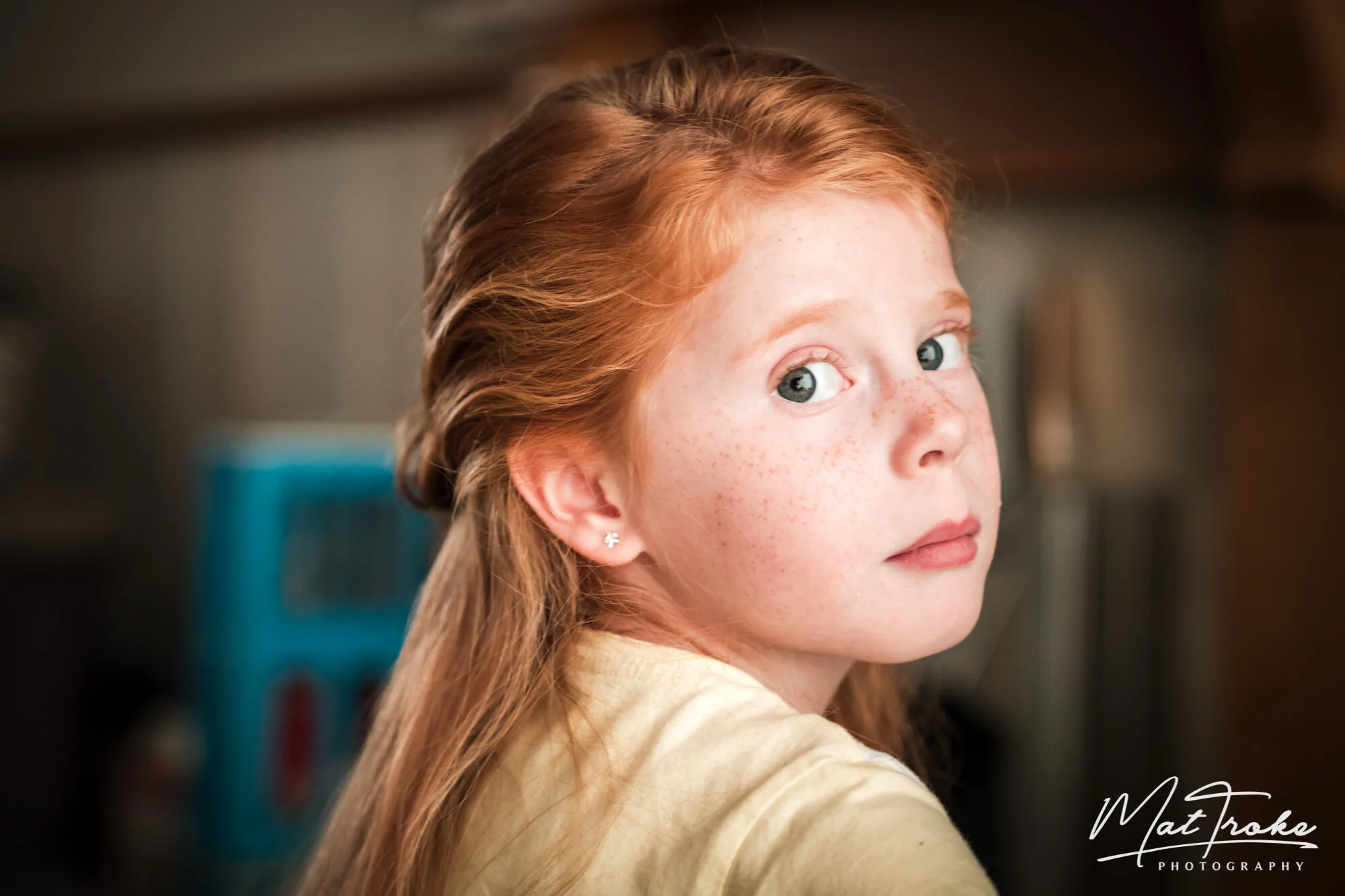Beautiful flower girl portrait bridal prep red hair and happy smile