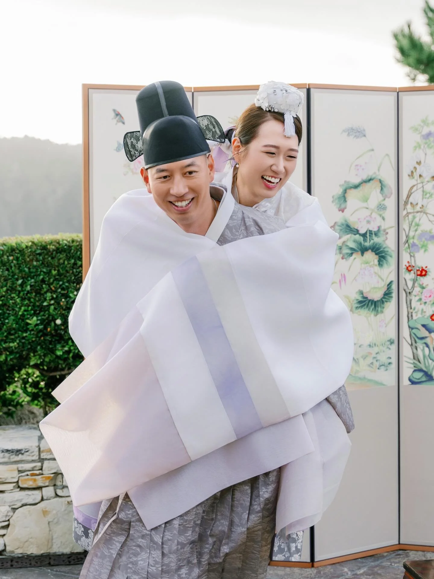 Paebaek(페백)is one of the most cherished traditions in a Korean wedding &mdash; a moment rooted in culture, family, and joy.

The ceremony begins with the couple bowing deeply to their parents, followed by tea as words of blessing are shared.

Dates a