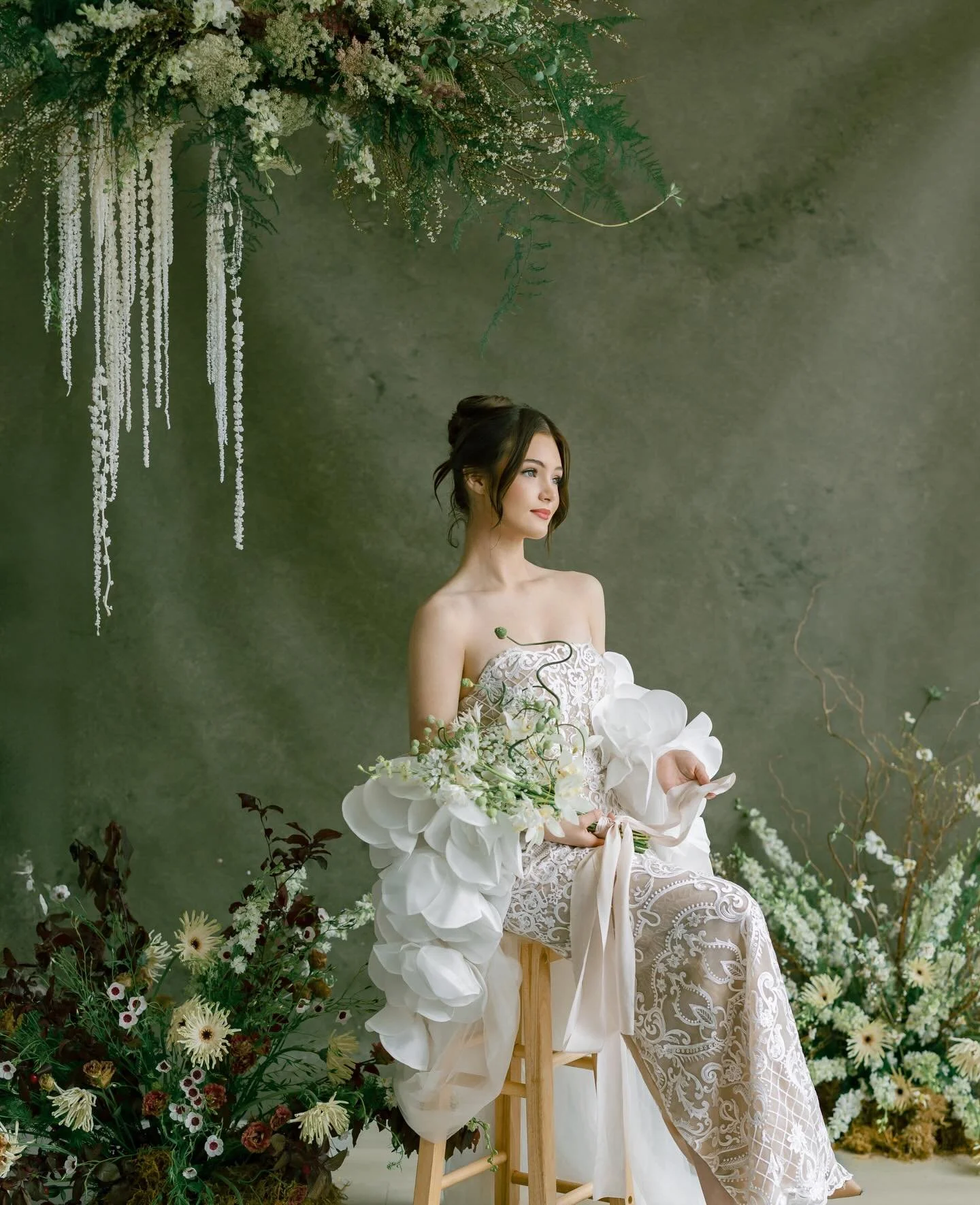 The olive green palette feels calm, grounded, and quietly serene.

Soft, organic, and slightly untamed &mdash; the florals bring just enough movement, as if she&rsquo;s simply part of the garden.

Studio&nbsp;@creativespacestudios.co
Floral Design &a