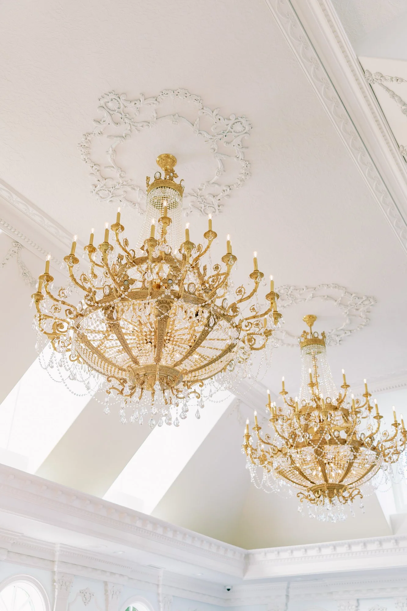 Crystal chandeliers inside Château de Michellia wedding venue in Oregon.