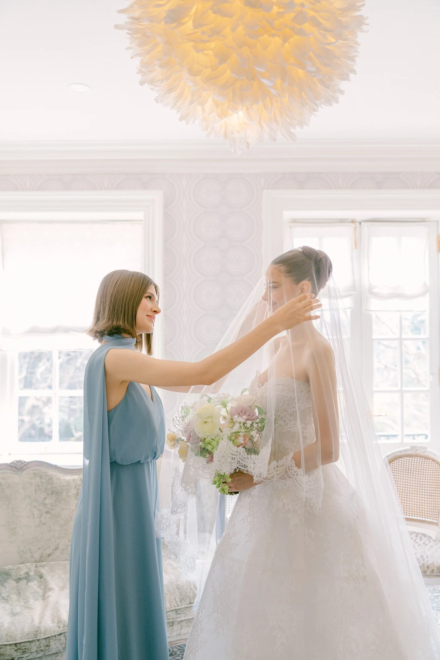 Bride getting ready with veil indoors at graydon hall manor
