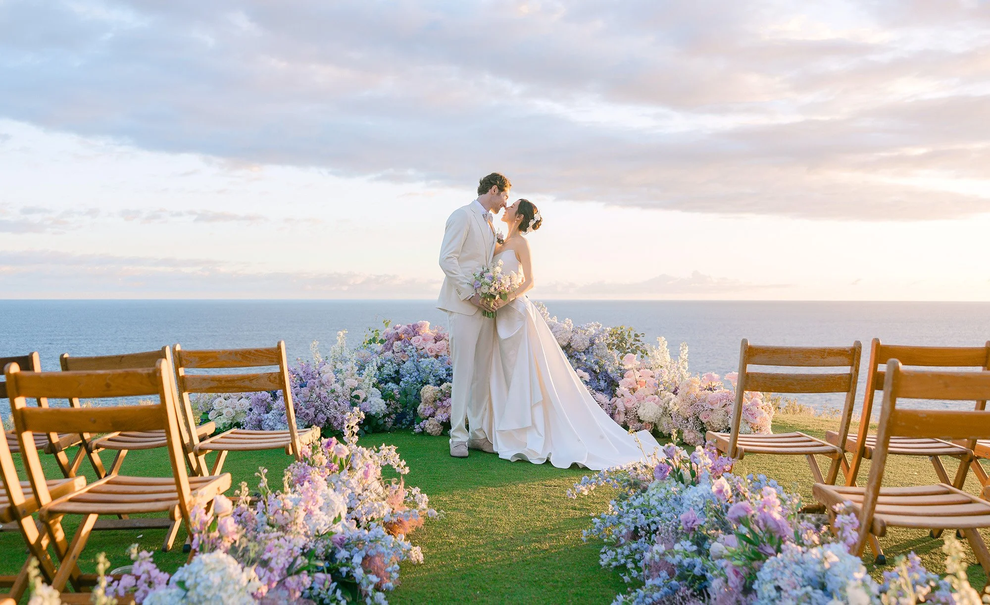 Bride and groom portrait during an ocean view wedding ceremony at Four Seasons Resort Lanai, Hawaii
