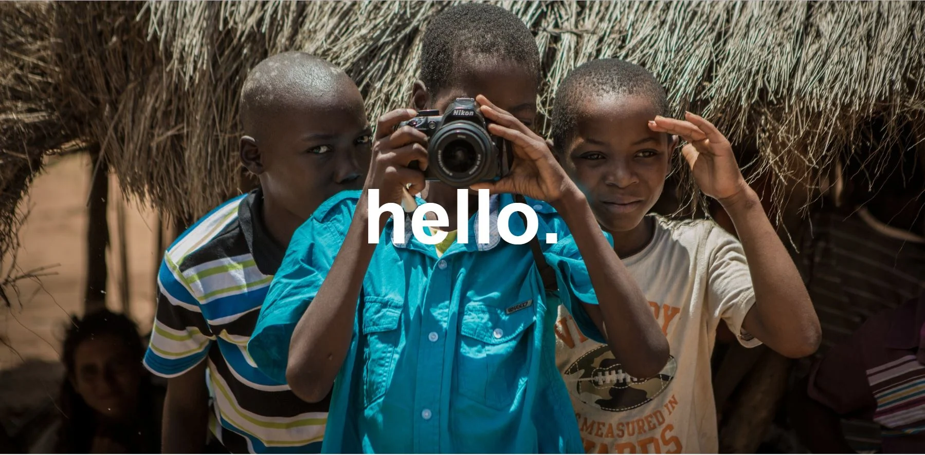 Kids with Camera.JPG