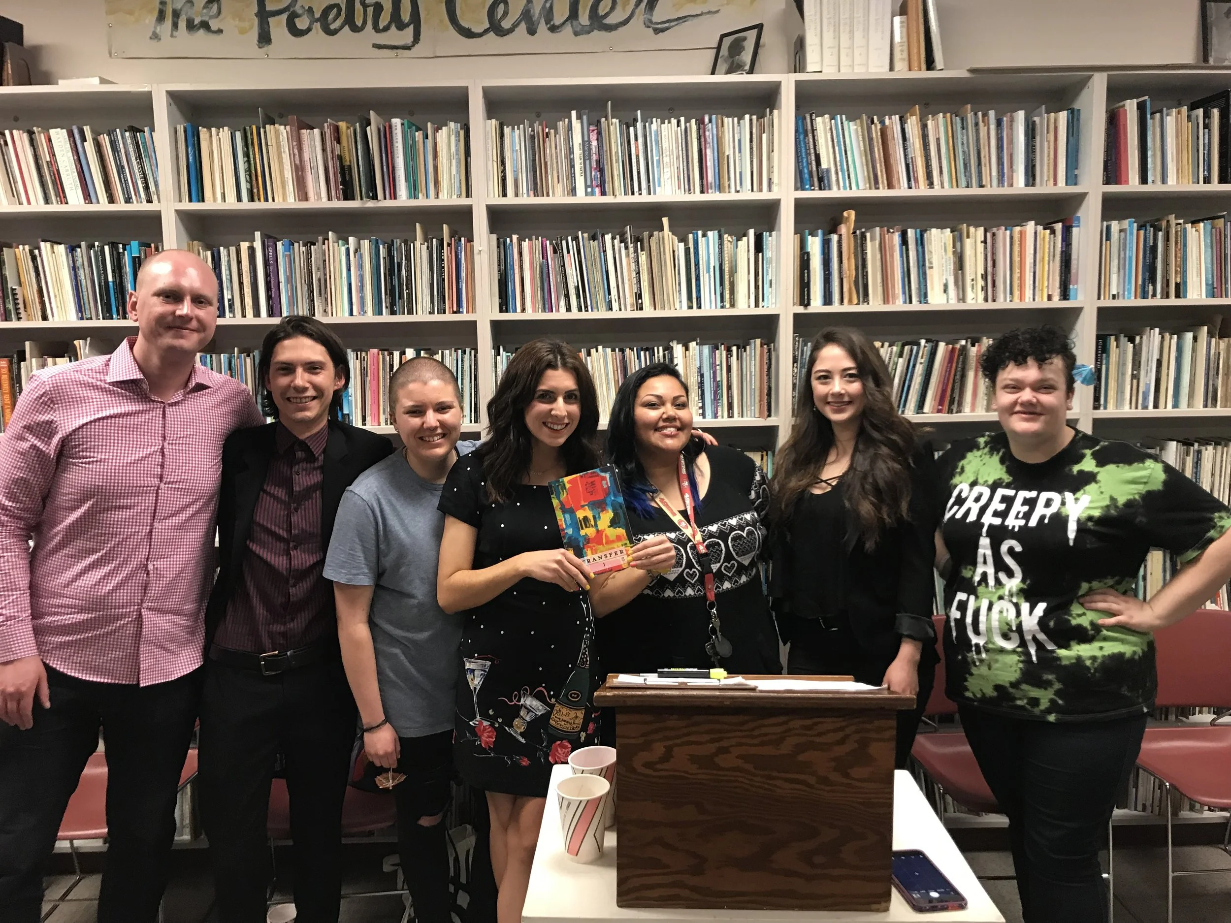 The Transfer 115 editors at the release party at the Poetry Center (San Francisco State University) in May 2018. From left to right: James Giffin (Digital Media Director), Hunter Thomas (Poetry Editor), Bella Rocha (Poetry Editor), Cori Amato Hartwig (Managing Editor), Estrellita Ruiz (Editor In Chief), Laurie Olson (Fiction Editor), and Aleesha Lange (Fiction Editor). 