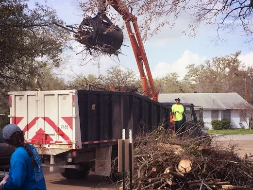 Nelson loading dumpster.jpg