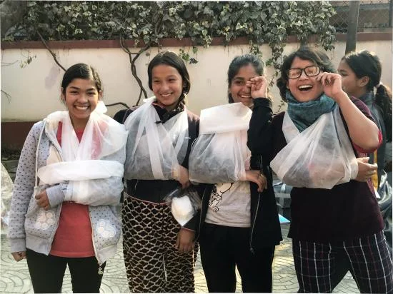 girls+laughing+with+arm+bandages.jpg