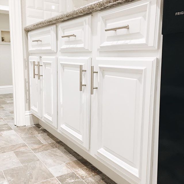Flash back to our first kitchen project. The countertops had recently been replaced by the original homeowner, so to save money, we worked all of our selections around them. In the kitchen we replaced the tile floor, painted the cabinets, added hardw