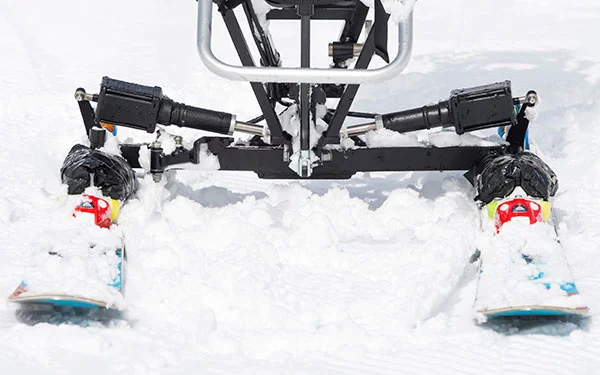 Actuators control each ski independently for aggressive turning.