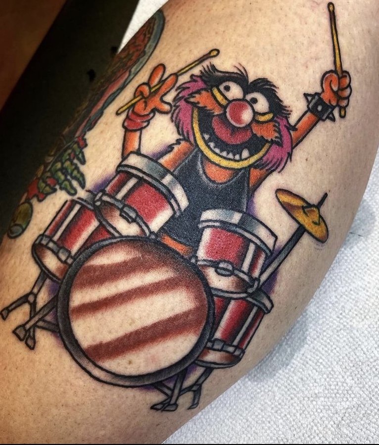 Animal Muppet patch tattoo located on the shin