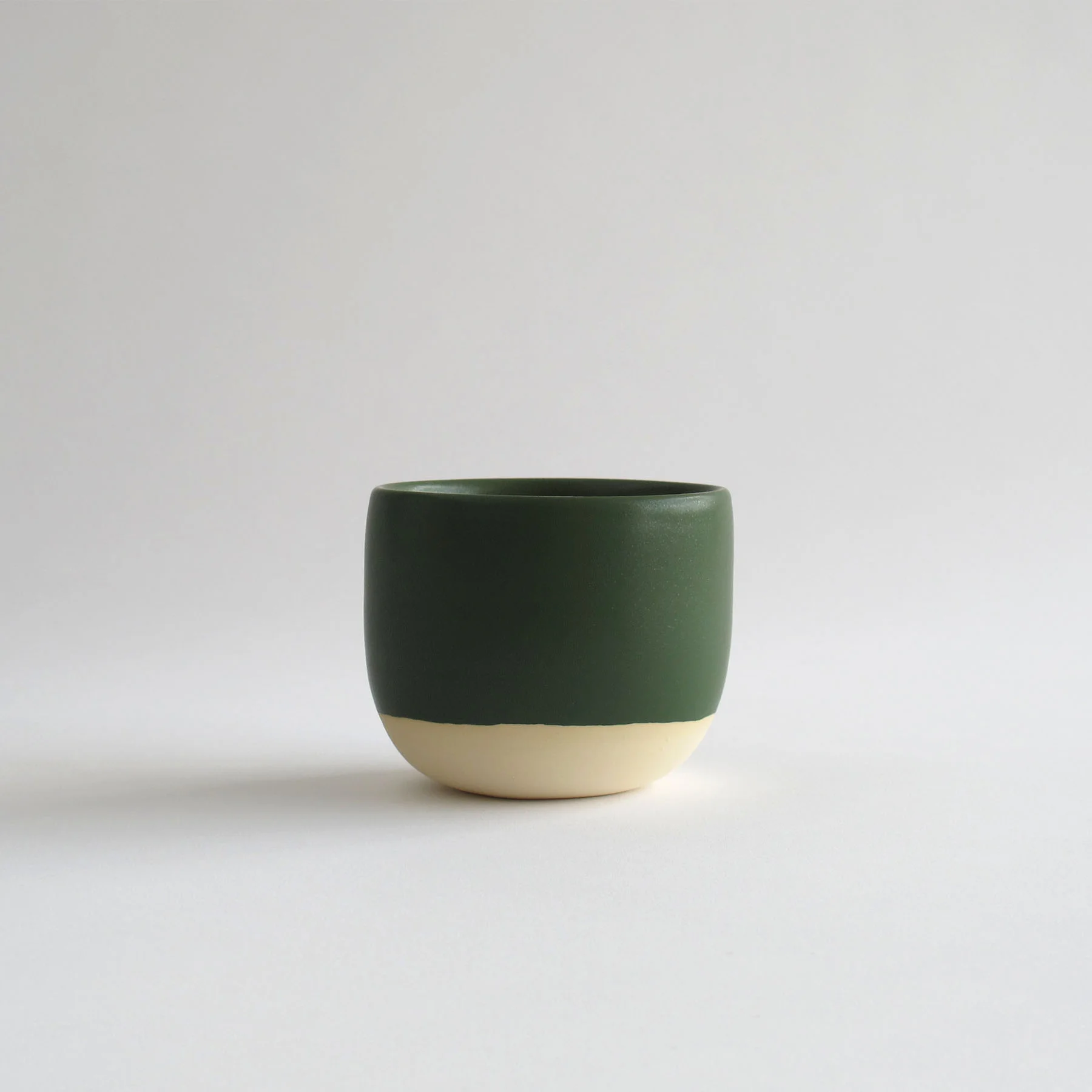 CGCERAMICS small planter in deep green | wheel thrown pottery & home decor | visit cg-ceramics.com to shop our collection | visit us on instagram @cgceramics