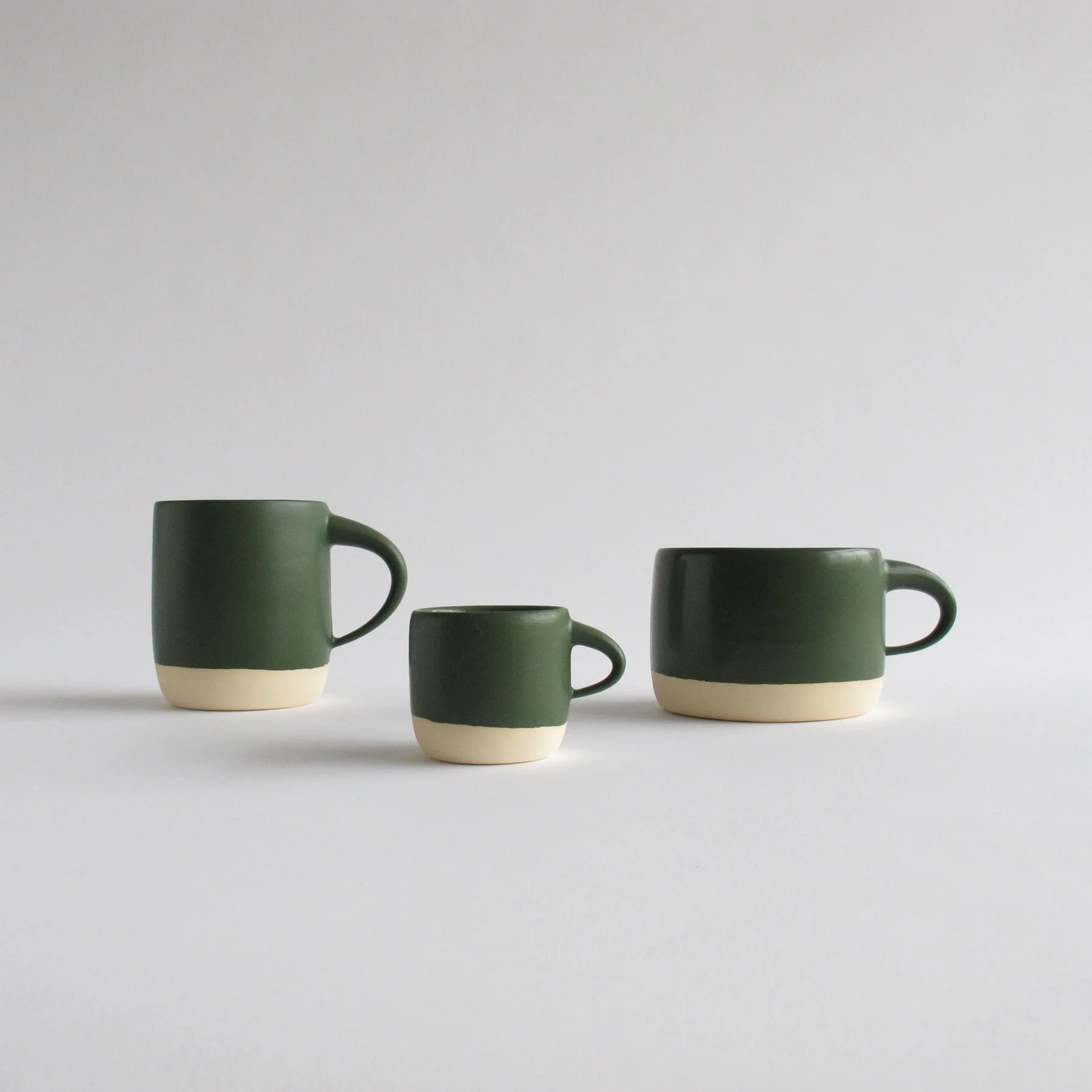 CGCERAMICS mug in deep green | tea & coffee | modern wheel thrown pottery & home decor | visit cg-ceramics.com to shop our collection | visit us on instagram @cgceramics