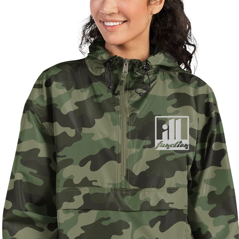embroidered-champion-packable-jacket-olive-green-camo-zoomed-in-67dd178704c5e.jpg