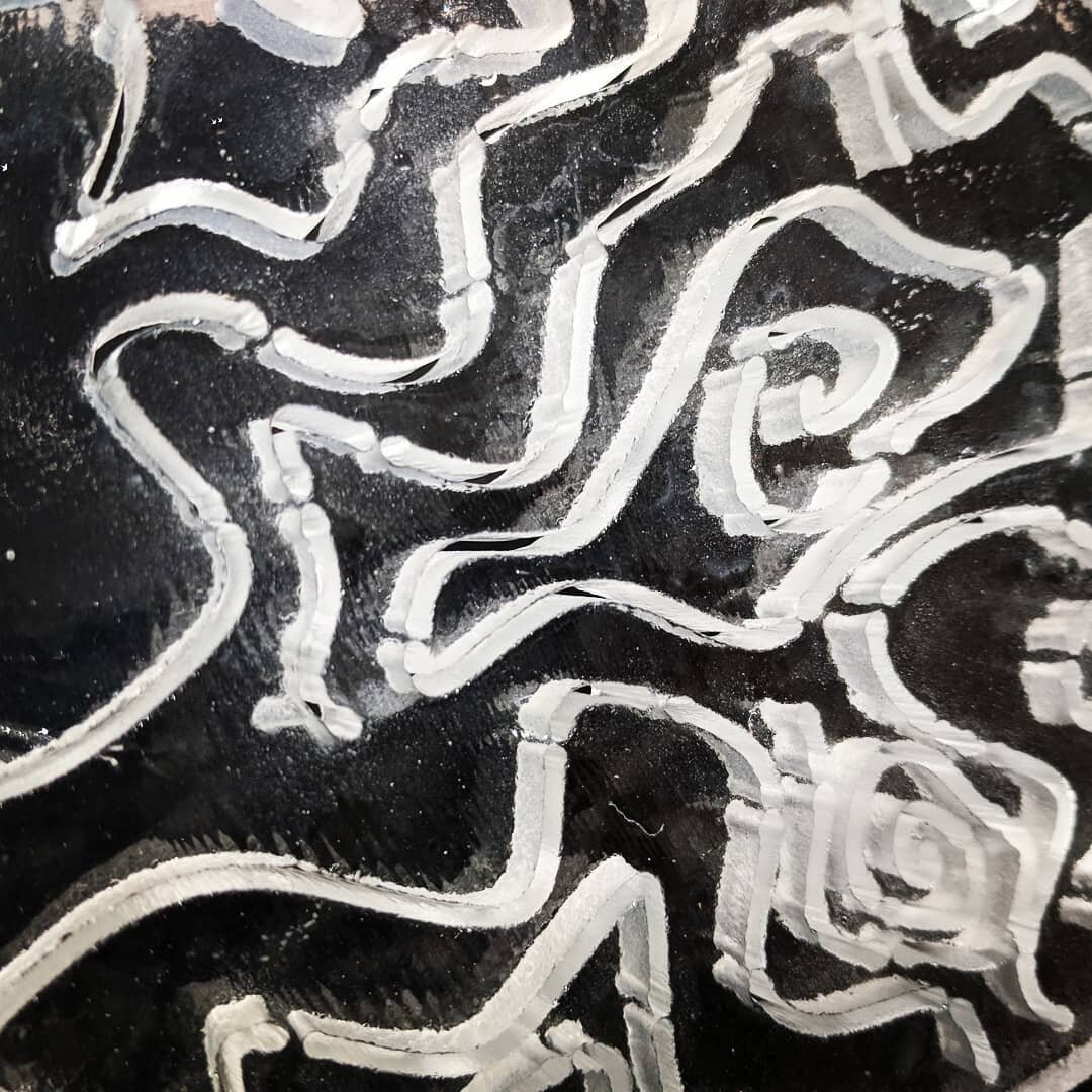 Experimenting with drawing with the waterjet. Demo for image and inclusion with my second years. A slab of 8 mm rolled furnace sheet, cut with slits that I will fill with enamel white powder, fire and roll up on a hot bubble, I'm going for a three di