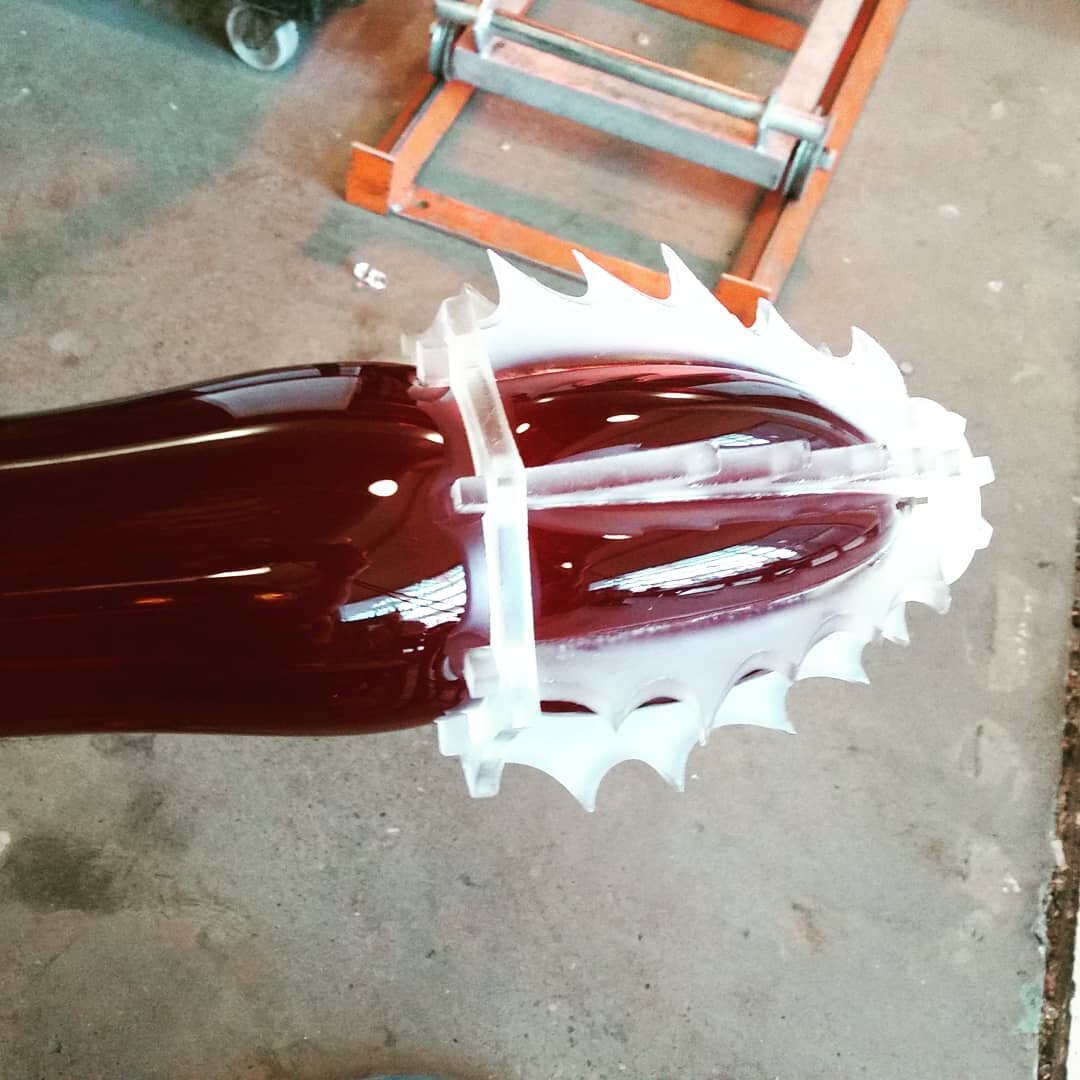 Here is the #waterjet cut cup blown into with a black bubble. I've left it pretty raw for this piece to give it a good deal of contrast.  #glassblowing #hotglass #glassart #sculpture #digitalglass #digitalcrafts