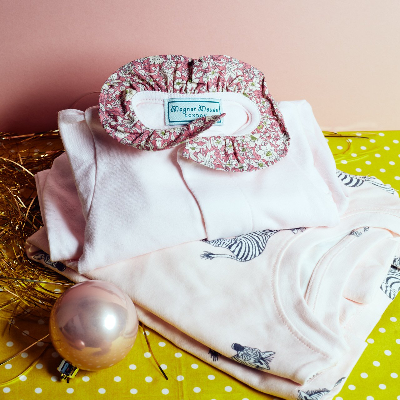  TIFFY &amp; TALULAH  Zebra Zzz's Mini Pyjama Set  £26.00  MAGNET MOUSE  Pale Pink Ruffle Onesie  £24.95     