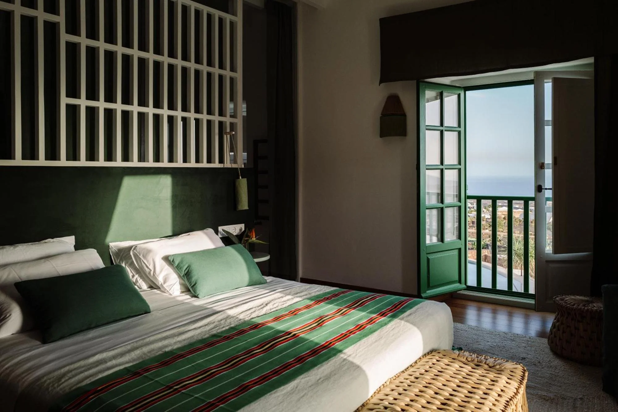 Green bedrrom with sea views at César Lanzarote hotel in Lanzarote