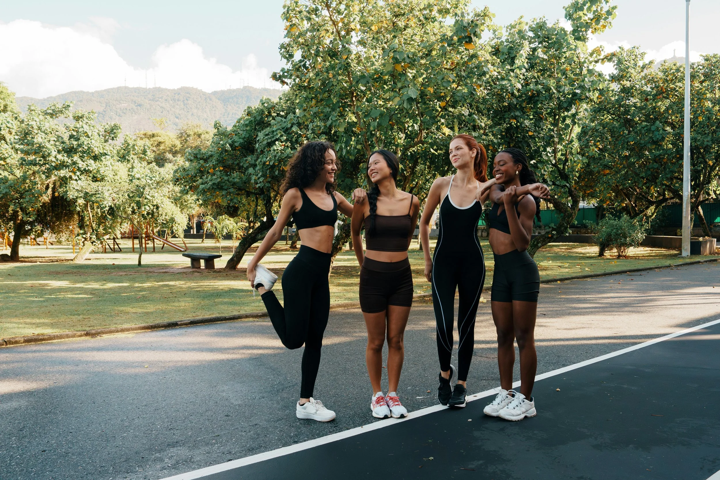 Women moving outdoors as part of a gentle January wellness reset