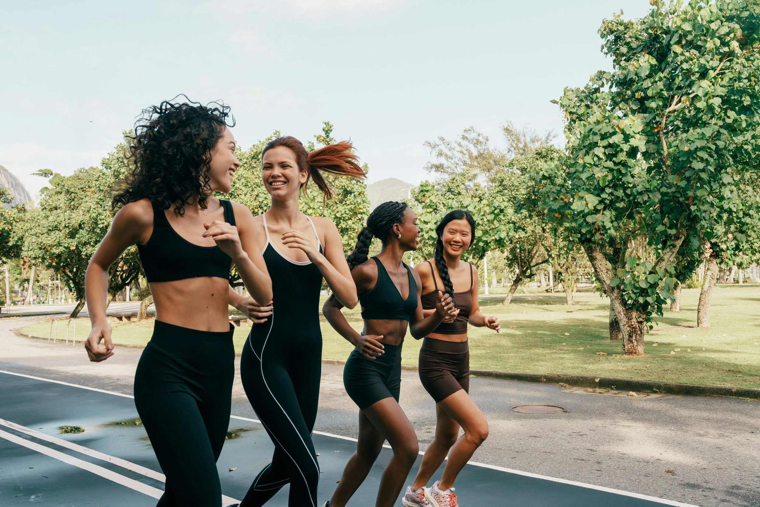 Women moving outdoors as part of a gentle January wellness reset