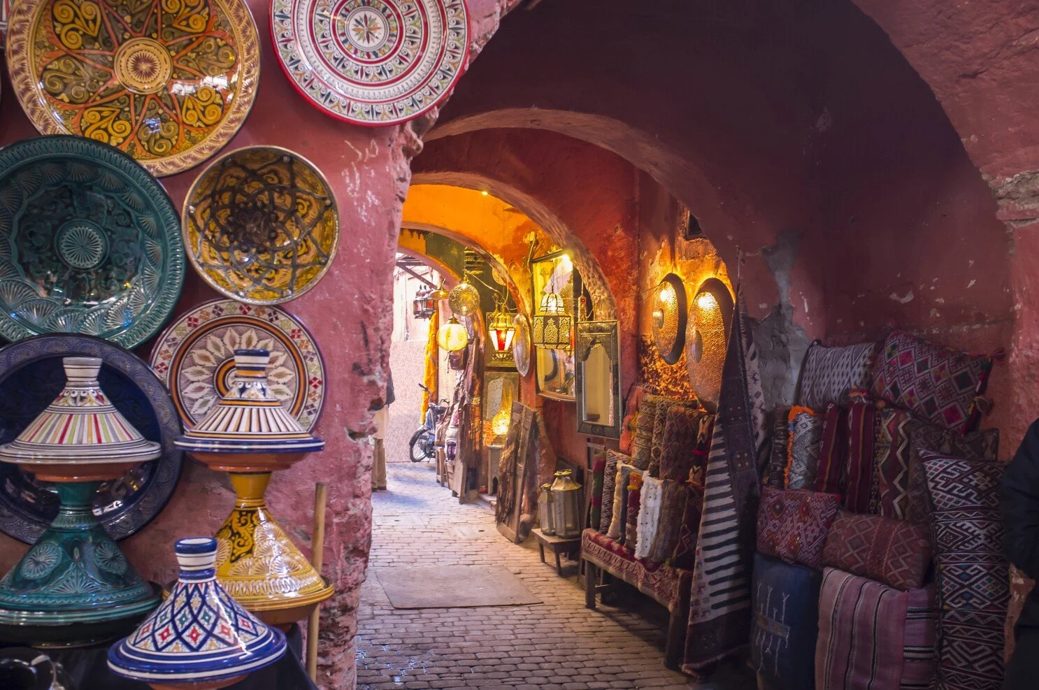 Colourful souk in Marrakech with Moroccan ceramics, textiles and lanterns