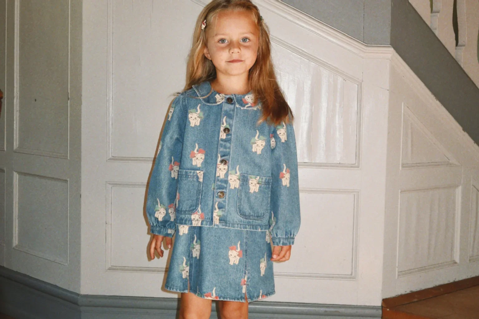 Konges Sløjd children’s denim dress floral print long sleeve kids outfit indoor portrait