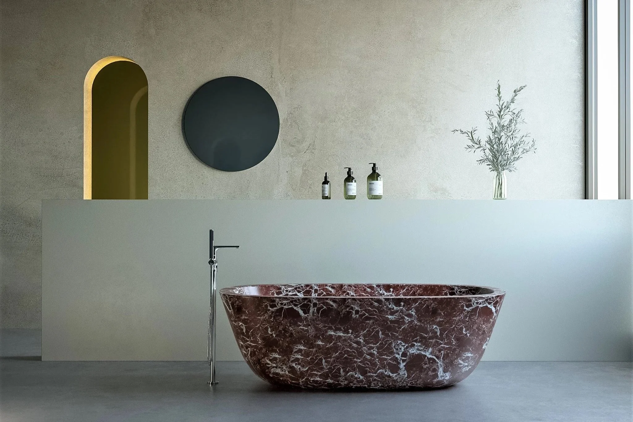 reestanding bath in a contemporary luxury bathroom showcasing the trend for coloured baths and basins.