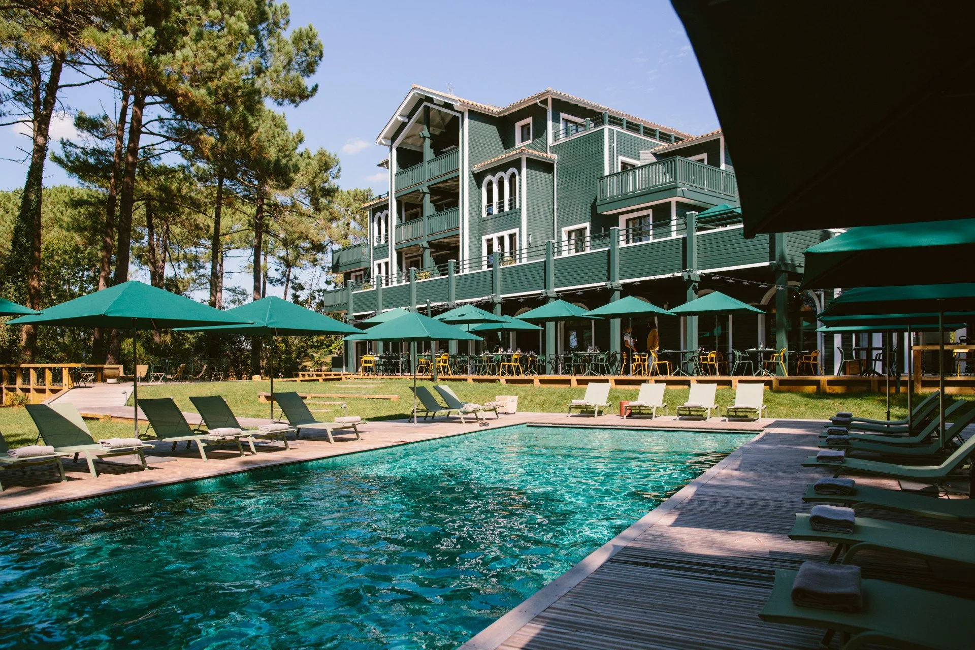 Exterior of 70 Hectares & l'Océan surrounded by pine forest near Lac d'Hossegor
