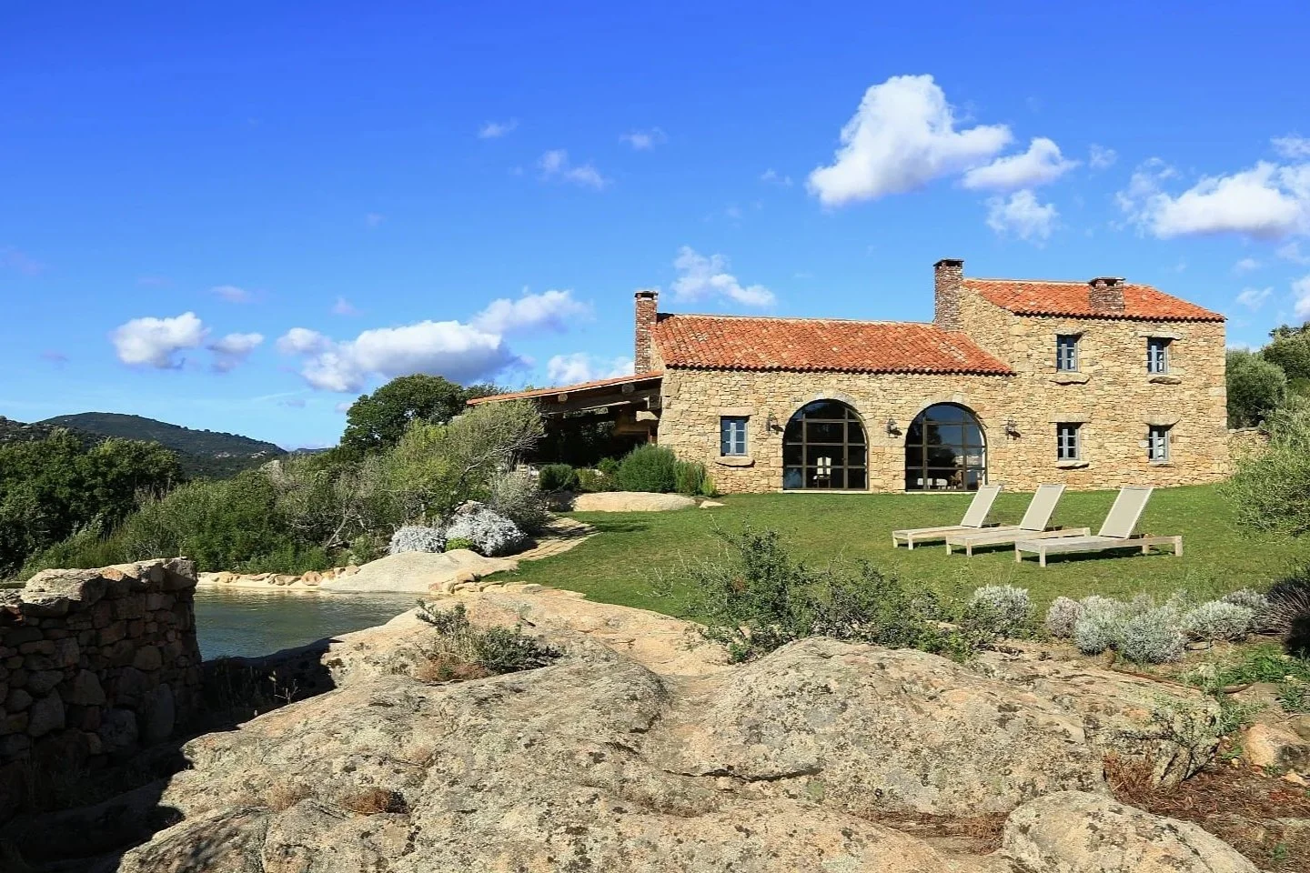 Domaine de Murtoli restored stone farmhouse set in Corsican countryside