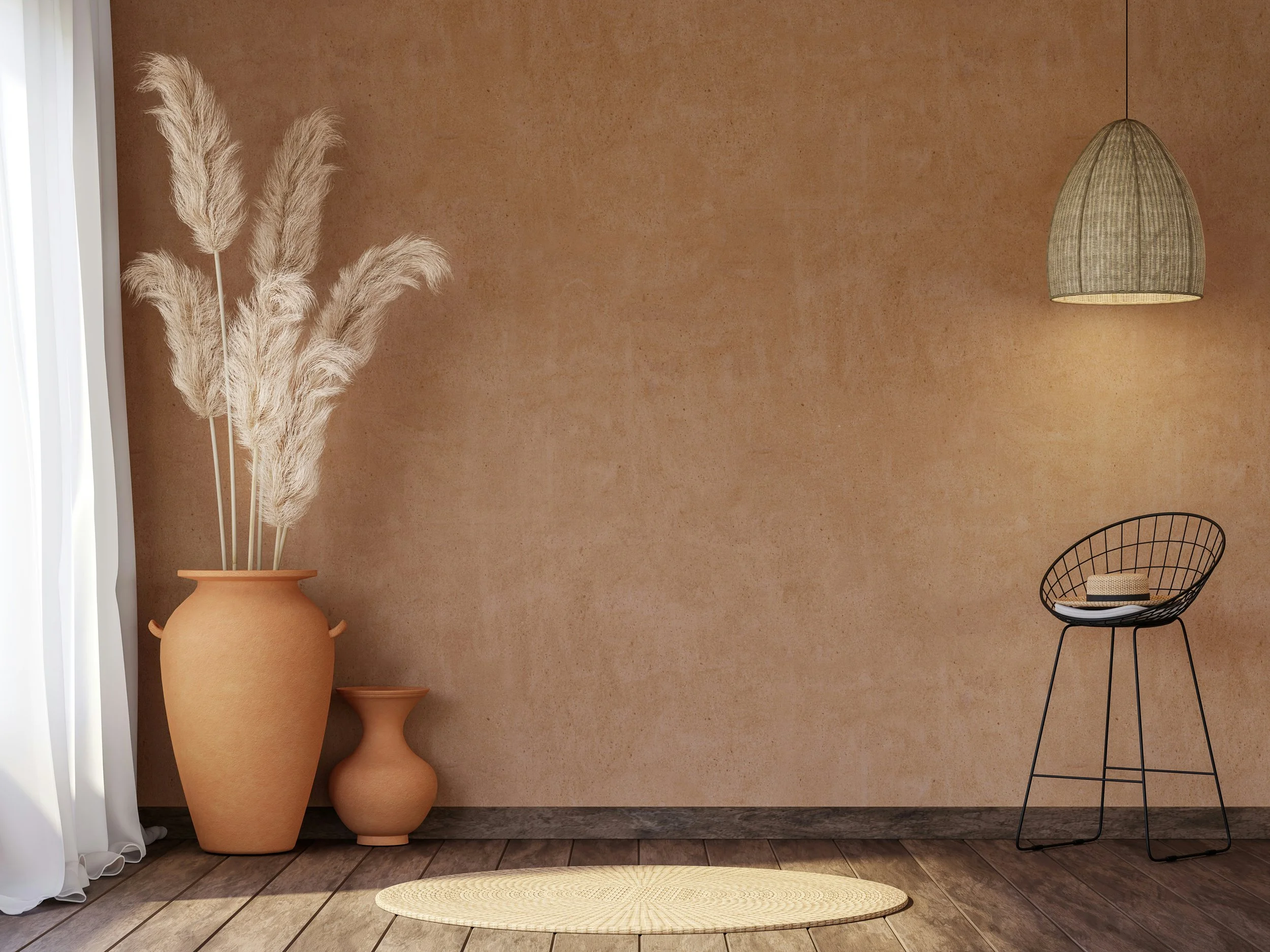 Terracotta-toned minimalist interior with pampas grass, natural textures and warm Mediterranean-inspired summer styling