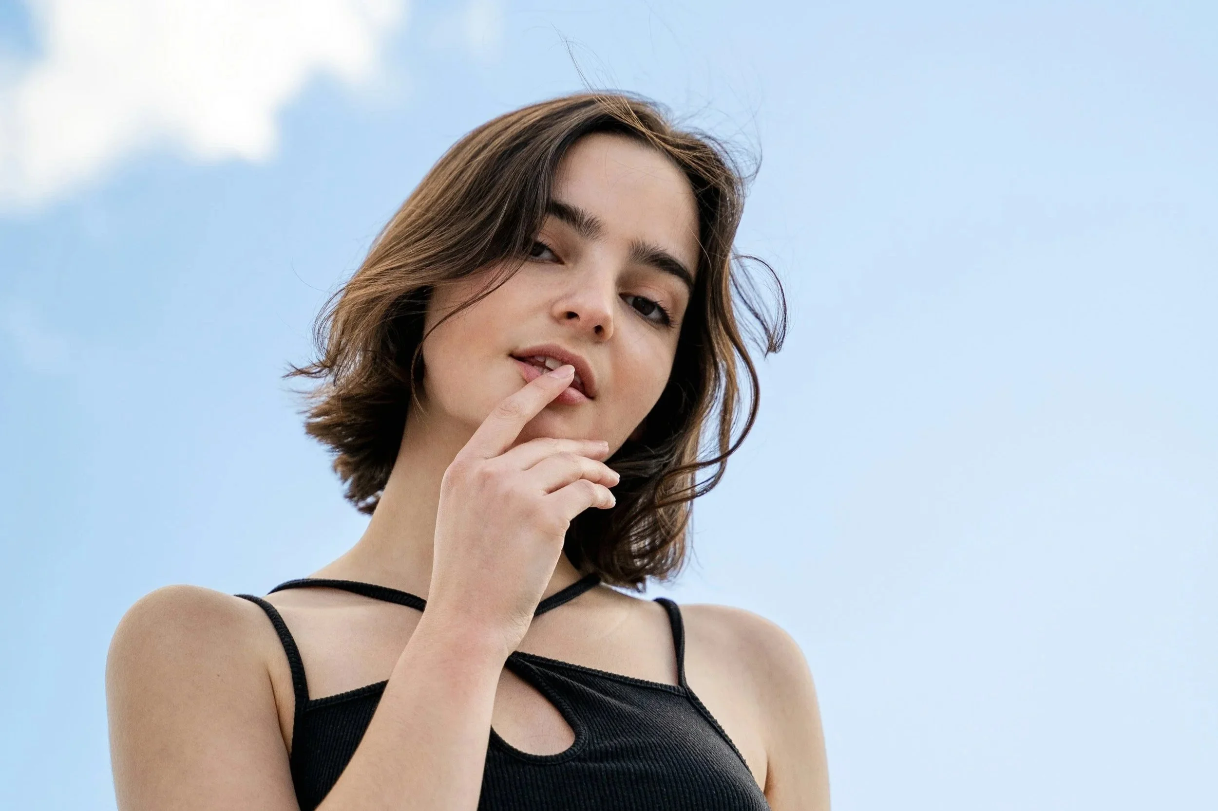 Woman showing face and neck for polynucleotide treatment feature