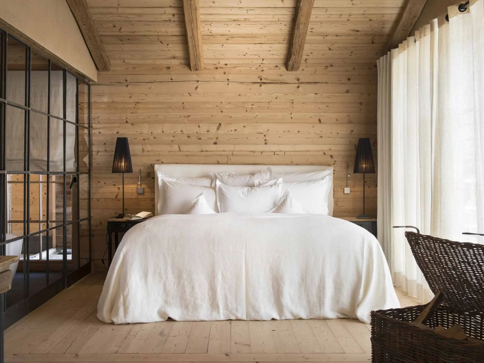 Wood drenched bedroom at the San Luis, Hafling Hotel