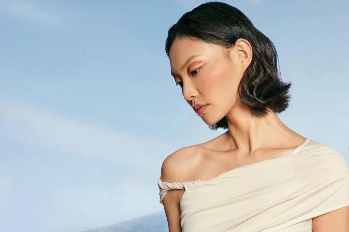 Florasis C-Beauty campaign featuring sculpted eye makeup against a pale blue background