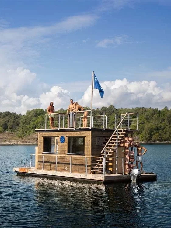 Floating sauna on the Oslofjord during a Scandinavian summer day