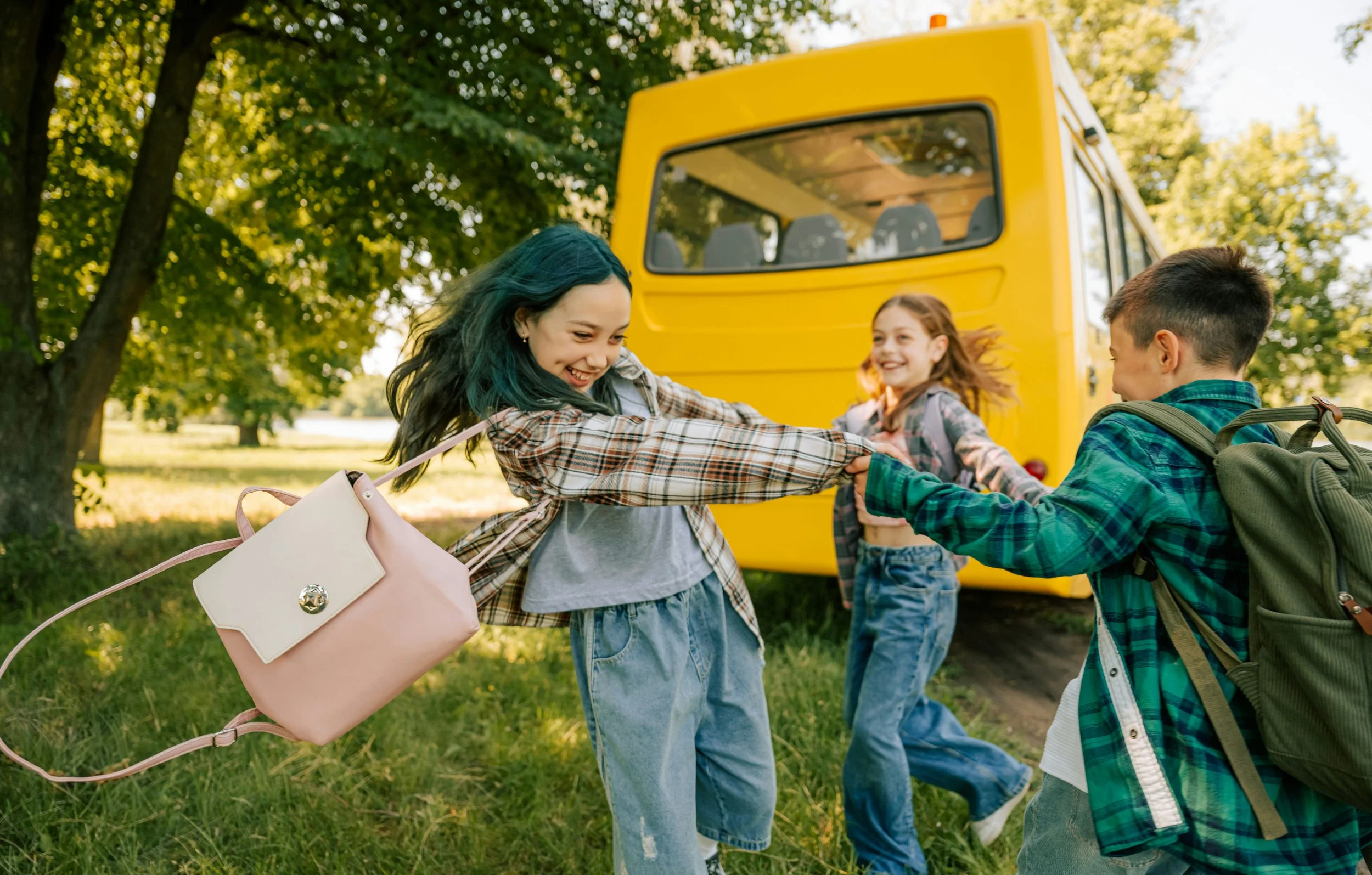 Schoolchildren playing together before the start of the new school year